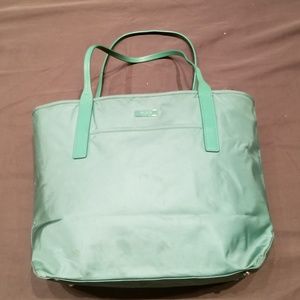 Green Tumi tote bag